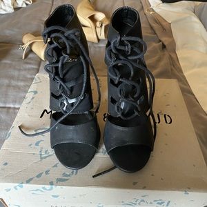 Lace up black leather heels